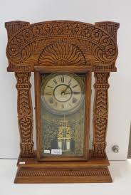 Sold at Auction: American pressed timber cottage clock