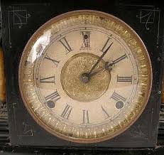 Lot - AN NEOCLASSICAL-STYLE SESSIONS EBONIZED MANTLE CLOCK