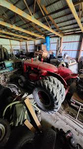 What is the value of a restored Schramm 125 tractor?