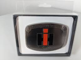 IH "Farming Is Our Business" with brushed pewter background ...