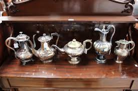 Sold at Auction: Silver plated teapots, coffee and water ...