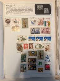 Stanley gibbons stamp album with hundreds of international ...
