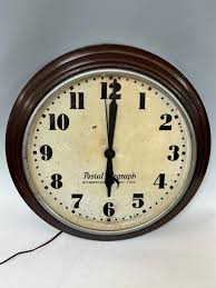 Sold at Auction: Hammond Postal Telegraph Bichronous Electric Round Clock
