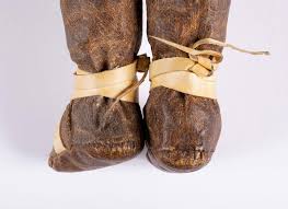 Sold at Auction: INUIT DOLL OUTFITTED IN VELLUM PARKA