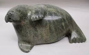 Sold at Auction: Josephie Eeyevadluk, INUIT STONE CARVING OF A WALRUS WITH CANADIAN LABEL ON THE BASE. 11" WIDE, 5" TALL. ATTRIBUTED TO EEYEVADLUK JOSEPHIE, B 1938. ESTIMATE $300-1000