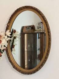 Oval ornate framed mirror, 27" x 18 1/2" - Atterberry ...