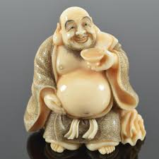 Lot - Netsuke. Japan. 19th century. Hoi Tei drinking a cup ...