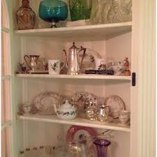 Vintage 1950s hutch with knick knacks