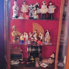 4 shelves- milk glass, figurines, etc | EstateSales.org