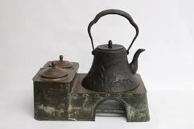 Sold at Auction: Japanese antique copper hibachi w/ cast iron teapot