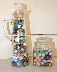 Sold at Auction: 2 jars of marbles