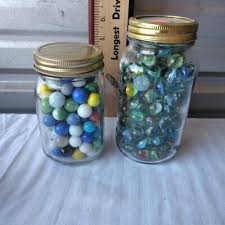 LOT 145 BLUE & YELLOW MARBLES AND MORE | EstateSales.org