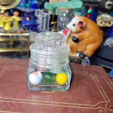 small glass jar with plastic twist off lid · Whatnot: Shop, Sell, Connect