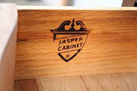 Sold at Auction: JASPER CABINET CO. MAHOGANY SECRETARY DESK