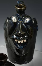 Sold at Auction: 6 PC. NORTH CAROLINA POTTERY FACE JUGS