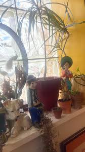 I'm a sucker for an odd little doll. Found these at savers ...