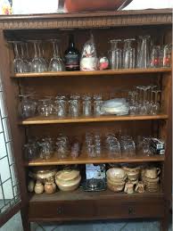 Lead-lined book / glass cabinet complete with glasses ( does need some repair work to the 7 panes )