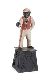 Lot - CAST IRON LAWN JOCKEY