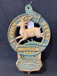 Sold at Auction: CAST IRON JOHN DEERE LETTER HOLDER