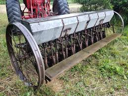 Grain drill discing before or after planting beams?