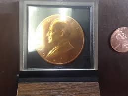 Dwight D. Eisenhower token bronze medal coin, in display ...