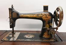 Sold at Auction: Singer, Antique Singer Sphinx Treadle Sewing Machine