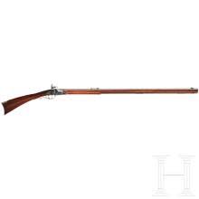Sold at Auction: A Pedersoli replica of a "Hatfield" flintlock rifle