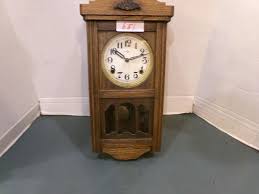 Sold at Auction: WIND UP WALL CLOCK