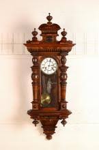 Sold at Auction: Wall clock with Helvetia and quarter hour ...