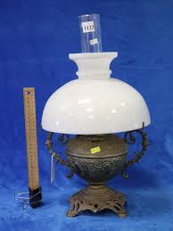 Lot - BRADLEY & HUBBARD METAL BASE OIL LAMP WITH CHIMNEY & SHADE