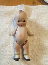 Vintage bisque porcelain 4 1/2 in. blue winged kewpie with jointed arms and legs