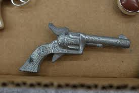 Sold at Auction: Grouping of 22 Metal & Plastic Toy Cap ...