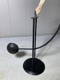 Sold at Auction: Folk Art Style Balancing Metal Cowboy ...