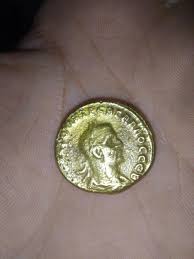 Can you please help me identify what is this coin , and does it worth anything? (It is not gold probably) : r/coincollecting