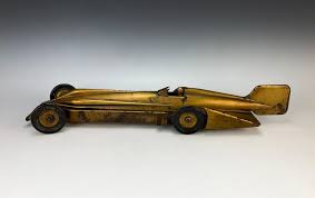 Sold at Auction: Kingsbury Toy Golden Arrow Speed Record Car