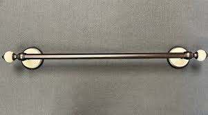 18" Alexandria Towel Bar Set Rubbed Bronze and Aged Ceramic