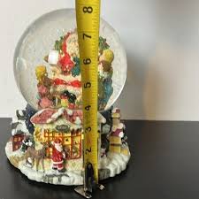 World bazaars Christmas Santa and children snow globe