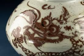 Sold at Auction: A KOREAN WHITE PORCELAIN TEAPOT WITH DRAGON IN IRON-PAINTING