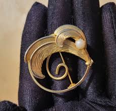 Gold Tone Round Brooch With Swirled Feather Design and ...