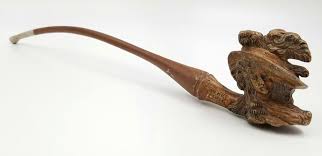 Sold at Auction: An Antique Carved Clay Pipe by Charles Crop of London. 30cm.