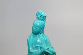 Sold at Auction: Chinese Green Resin Figure on Wood Stand