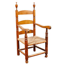 Lot - WALLACE NUTTING CHILD'S LADDERBACK CHAIR.