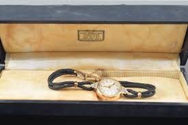 Lot - 2 vintage gold ladies pocket watches. 1) Tissot-Turler model. Round diamond mounted. 14K? gold