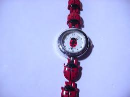 Sold at Auction: VINTAGE LADYBUG WATCH