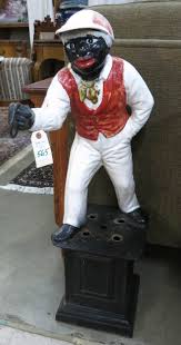 Lot - FIGURAL CAST IRON 'LAWN JOCKEY' HITCHING POST, a "
