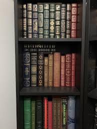 Several years of collecting and now we have our own personal library room! : r/bookshelf