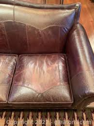 Custom Made Ostrich Leather and Cowhide Sofa with Nailhead Trim Auction | Gleaton's, Metro Atlanta Auction Company, Estate Sale & Business Marketplace