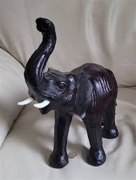 Brown Leather wrapped Elephant sculpture display