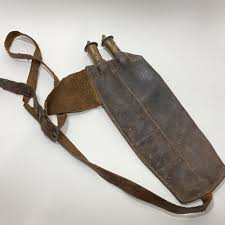 Sold at Auction: LEATHER BLACK POWDER FLASK HOLSTER BELT