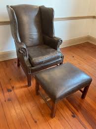 Sold at Auction: Vintage Brown Leather Chair with Ottoman